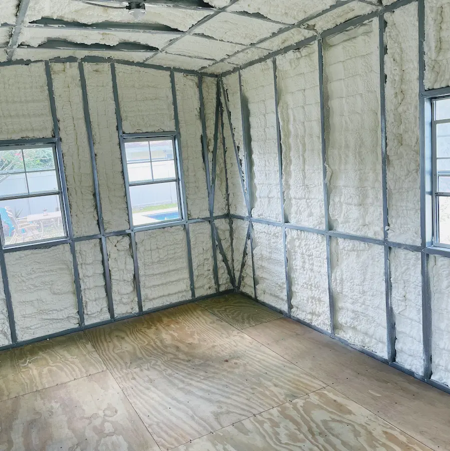Closed-cell spray foam insulation applied to wall cavities in a residential project in Oakland Park